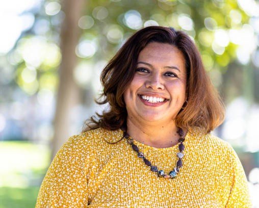 portrait of a beautiful mexican woman at a park